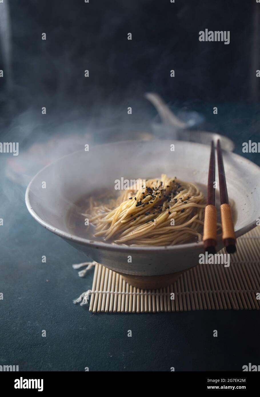 Hot japanese noodles ramen with broth dash or dashi and sesame Stock Photo Alamy