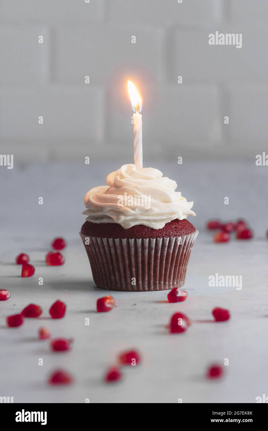 Red velvet cupcakes on a white work surface Stock Photo
