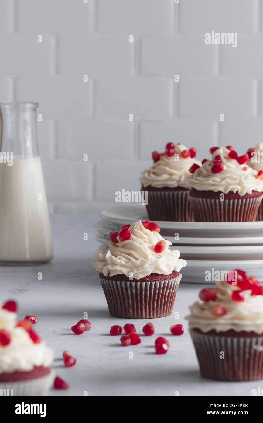 Red velvet cupcakes on a white work surface Stock Photo