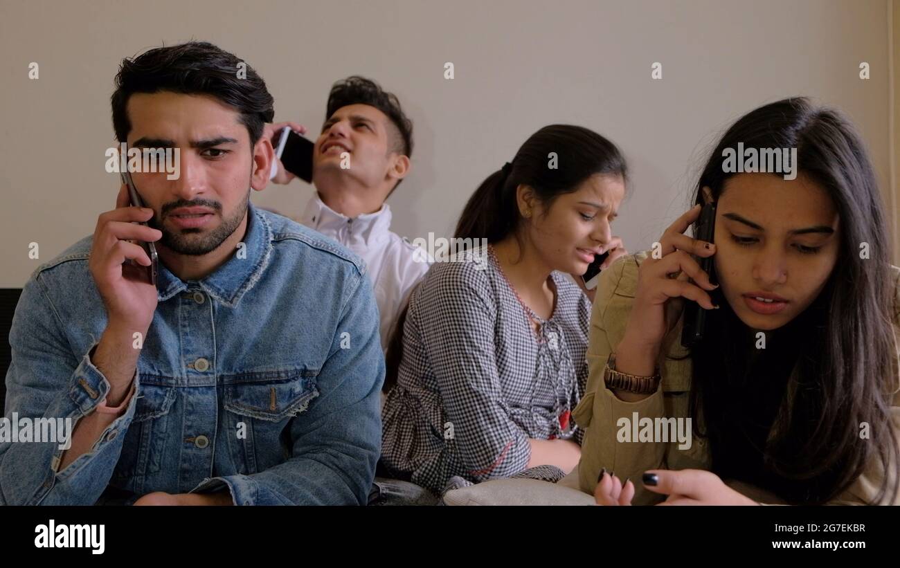 Phone Using Indians Indian people using smartphones hi-res stock photography and images - Alamy