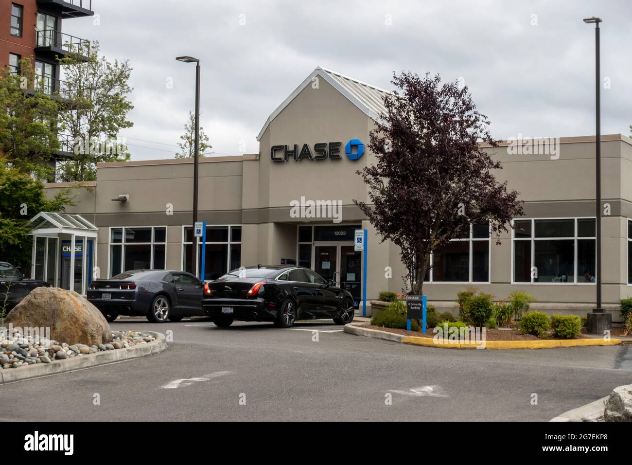Kirkland, WA USA - circa July 2021: Street view of the drive thru banking area of a Chase bank. Stock Photo