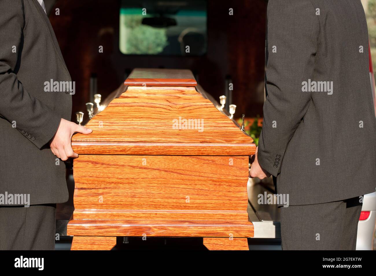 Dolor Funeral with coffin on a cemetery, the casket carried by coffin