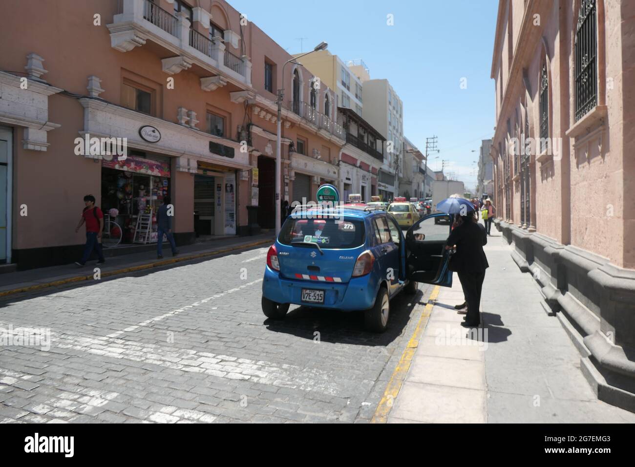 Arequipa Peru car parked in street shop shops Village sign architecture