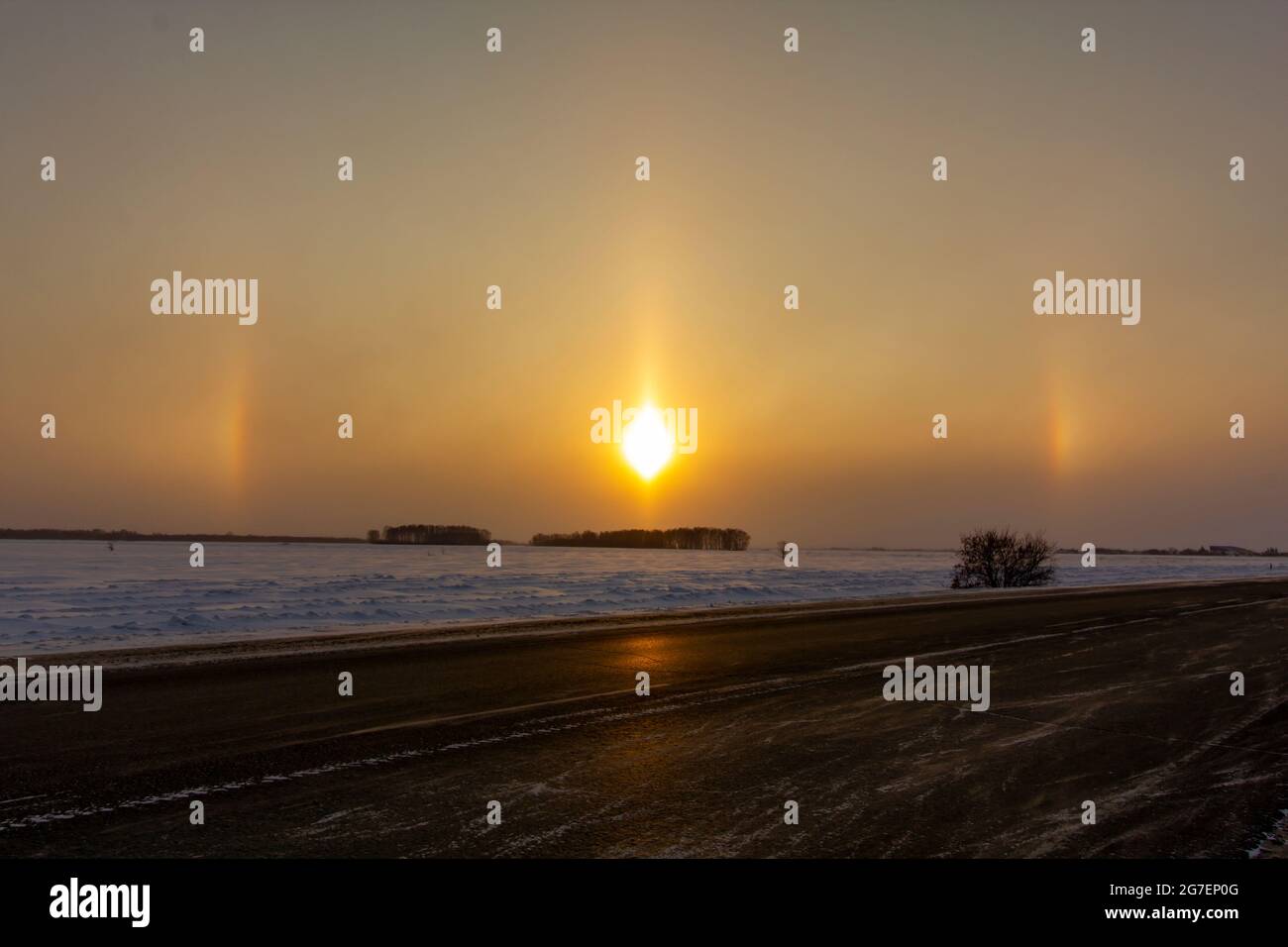 Solar optical halo effect in the early morning. The concept of studying the environment. Stock Photo