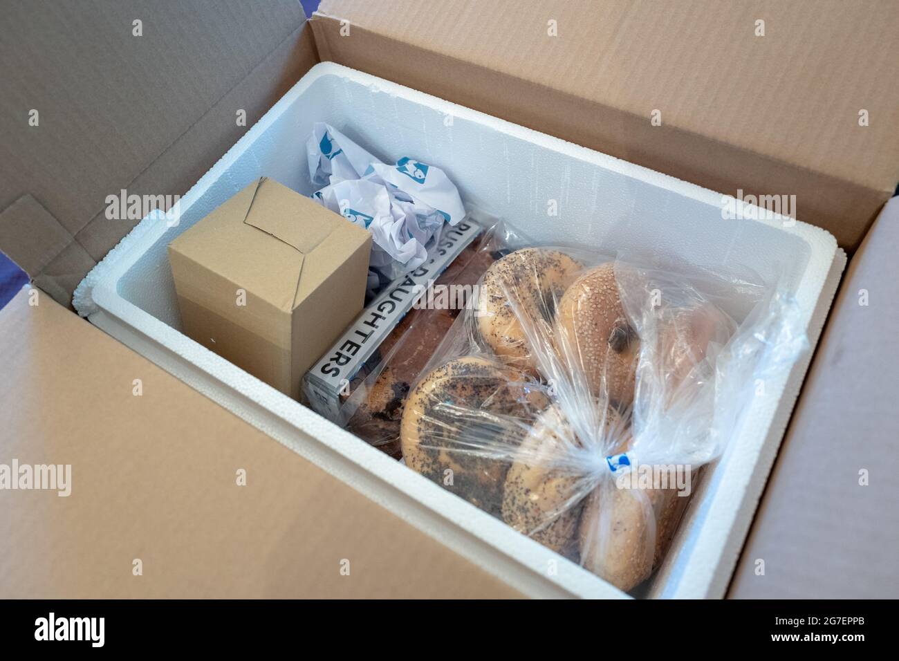 Bagels, coffee and other contents of a Russ and Daughters delivery box in Lafayette, California, part of an artisan food delivery program, June 15, 2021. () Stock Photo