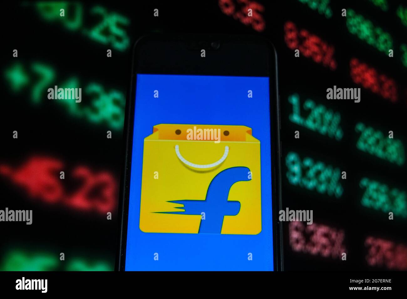 Poland. 13th July, 2021. In this photo illustration a Flipkart logo is seen displayed on a smartphone with stock market percentages on the background. Credit: Omar Marques/SOPA Images/ZUMA Wire/Alamy Live News Stock Photo