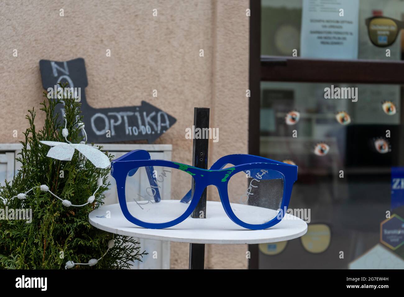 Timisoara, Romania - January 04, 2020: Big blue glasses on a table for Novum Optika Stock Photo