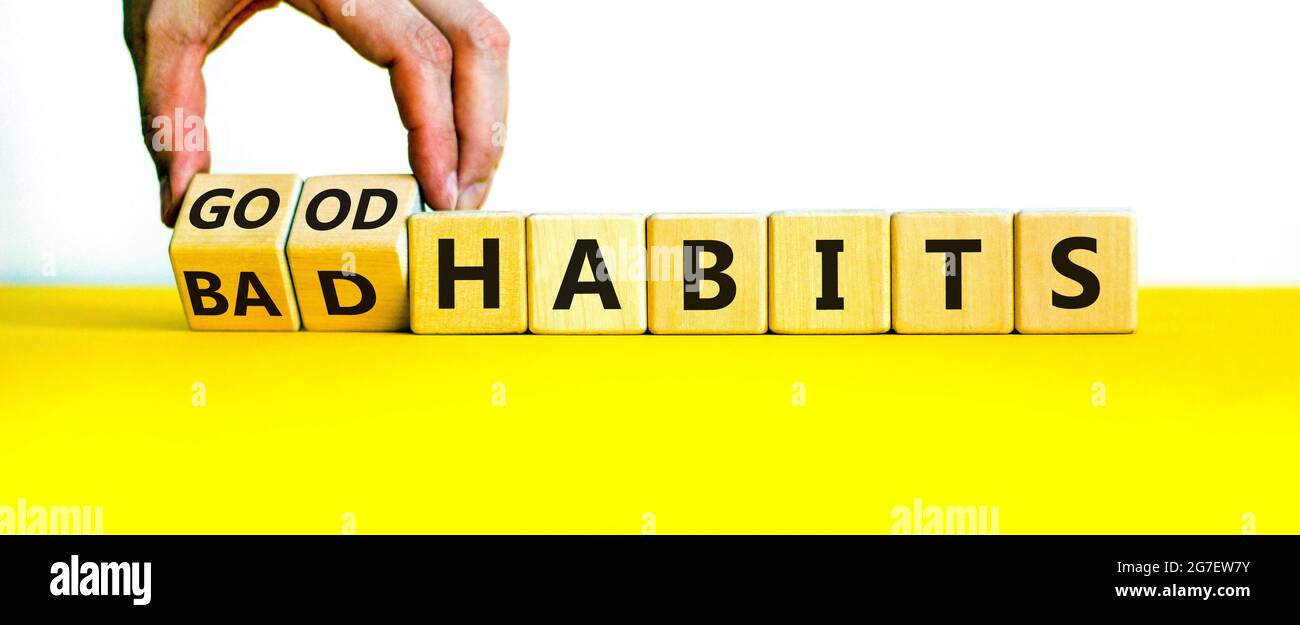 Good or bad habits symbol. Businessman turns wooden cubes and changes ...