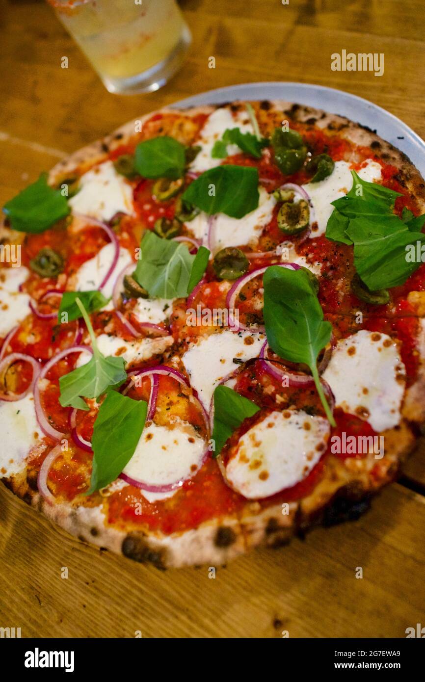 Overhead angle of pizza at Emily Loves Pizza restaurant in Brooklyn
