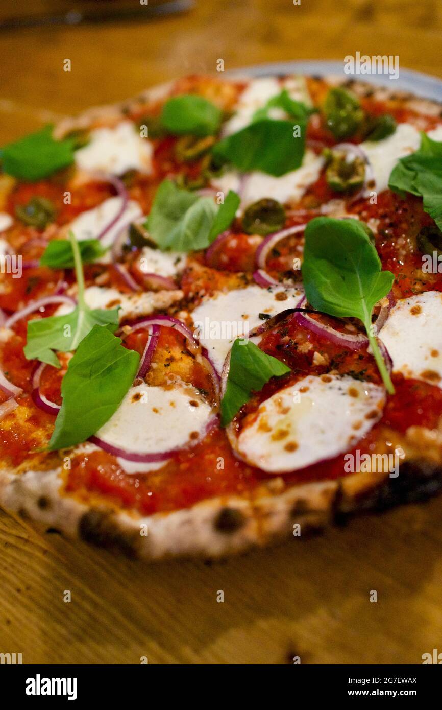 Overhead angle of pizza at Emily Loves Pizza restaurant in Brooklyn