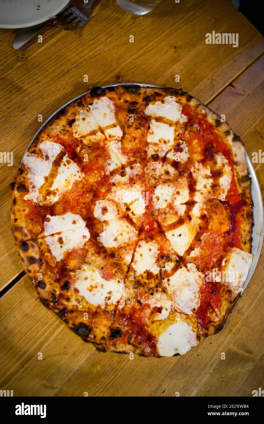 Overhead angle of pizza at Emily Loves Pizza restaurant in Brooklyn
