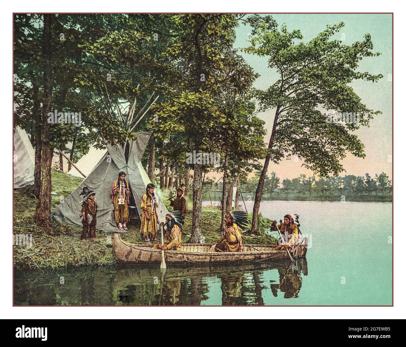 1900s 'The return of the hunters Hiawatha “ Detroit Photographic Co., c1904.  Photochrom, color. The Return Of The Hunters MInnesota, 1904 photochrom of the Native American Ojibwa hunters returning to their camp in their birchbark canoe. Stock Photo