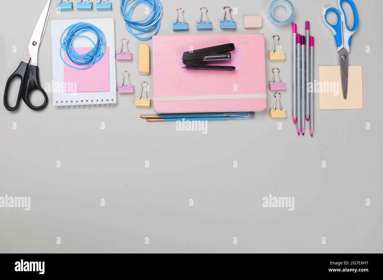Different school supplies on light grey background Stock Photo