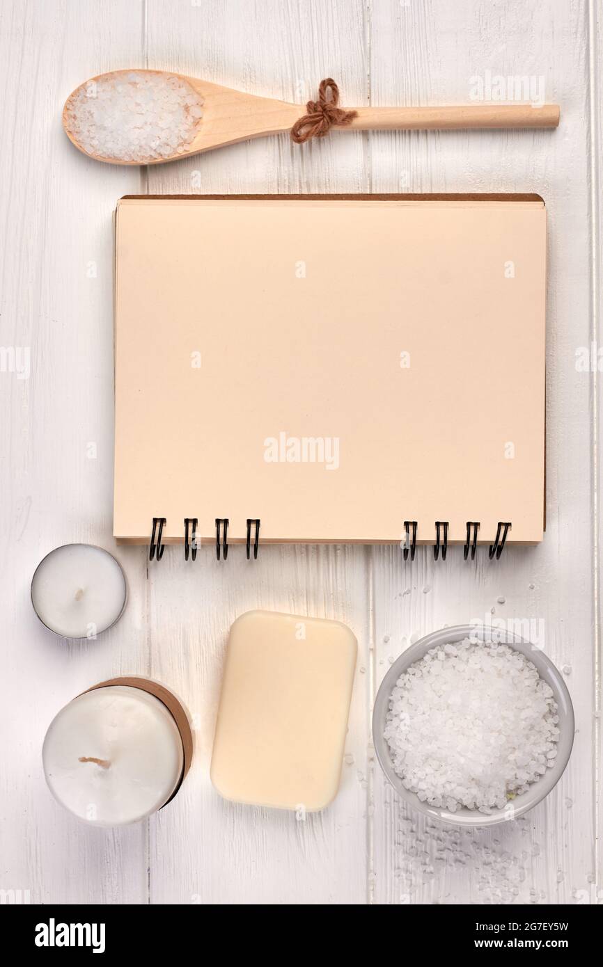 Flat lay blank notepad and spa accessories on white wood Stock Photo ...
