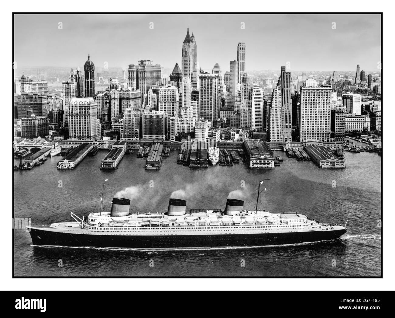 SS Normandie French Lines Vintage Travel B&W Image in New York  1936 The SS Normandie was a French ocean liner built in Saint-Nazaire, France, for the French Line Compagnie Générale Transatlantique (CGT). She entered service in 1935 as the largest and fastest passenger ship afloat, crossing the Atlantic in a record 4.14 days, and remains the most powerful steam turbo-electric-propelled passenger ship ever built. Stock Photo