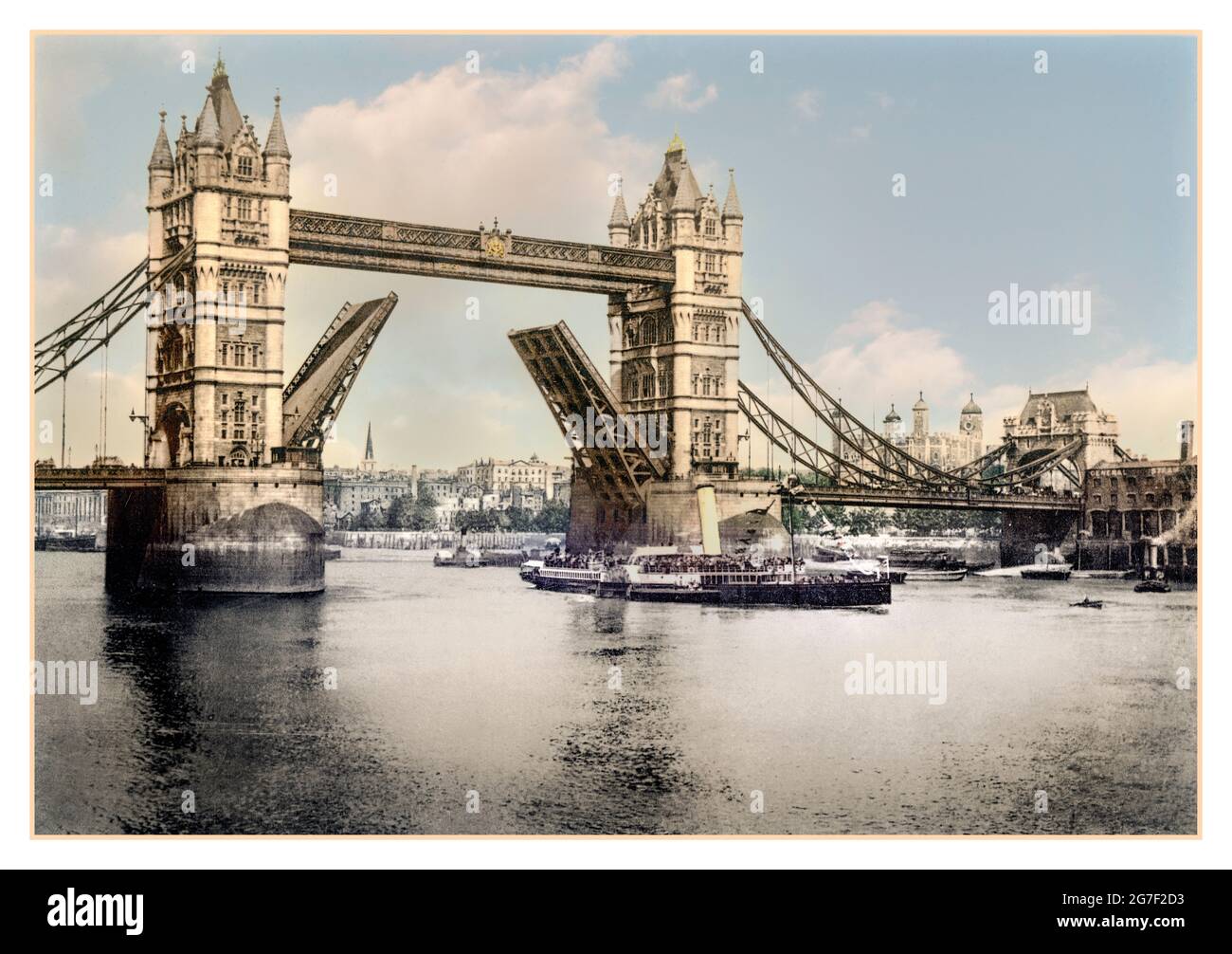 Tower Bridge Archive 1900s River Thames London at open position to allow a Victorian Tourist River Thames Travel steam driven paddle steamer to sail through London, England Date Created/Published: [between ca. 1890 and ca. 1900] : Photochrom, colour. Stock Photo