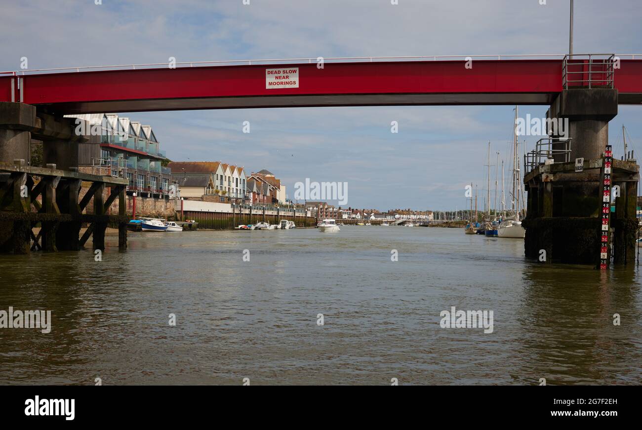 The Red Footbridge seen over the river Arun in Littlehampton, West Sussex, England, UK in 2021. Stock Photo