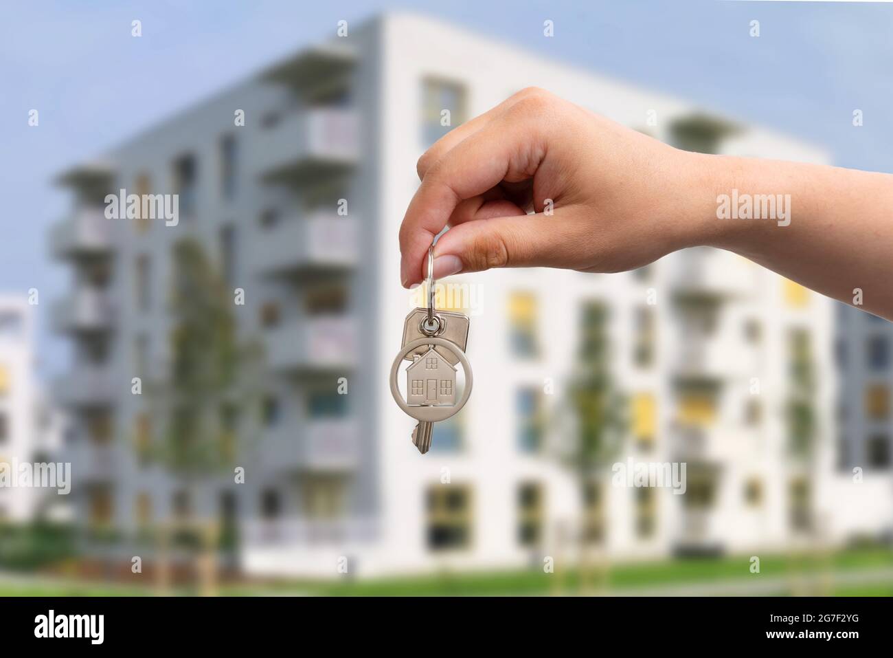 Hand holds the keys to the house, purchase of your own apartment concept Stock Photo