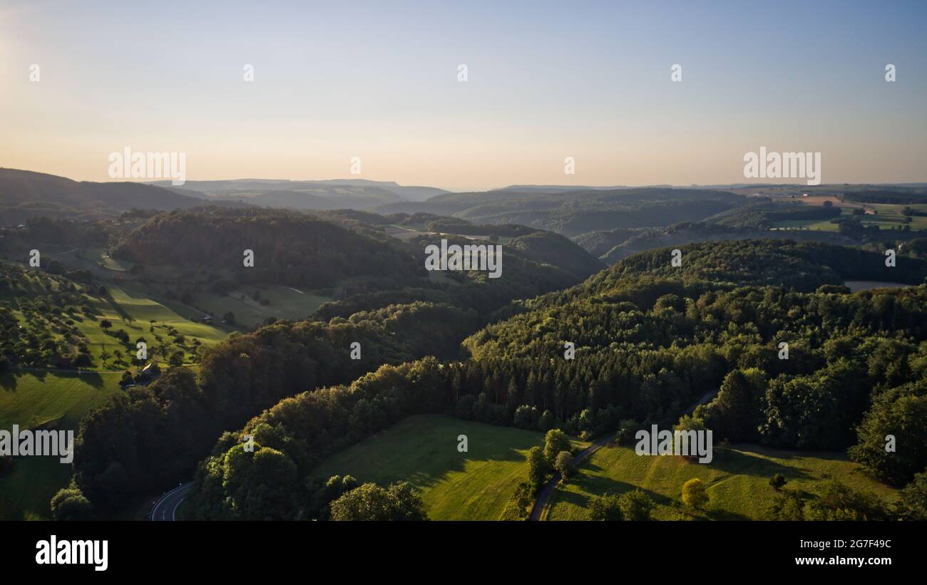 Aerial view of green dense forests on a sunny day Stock Photo - Alamy