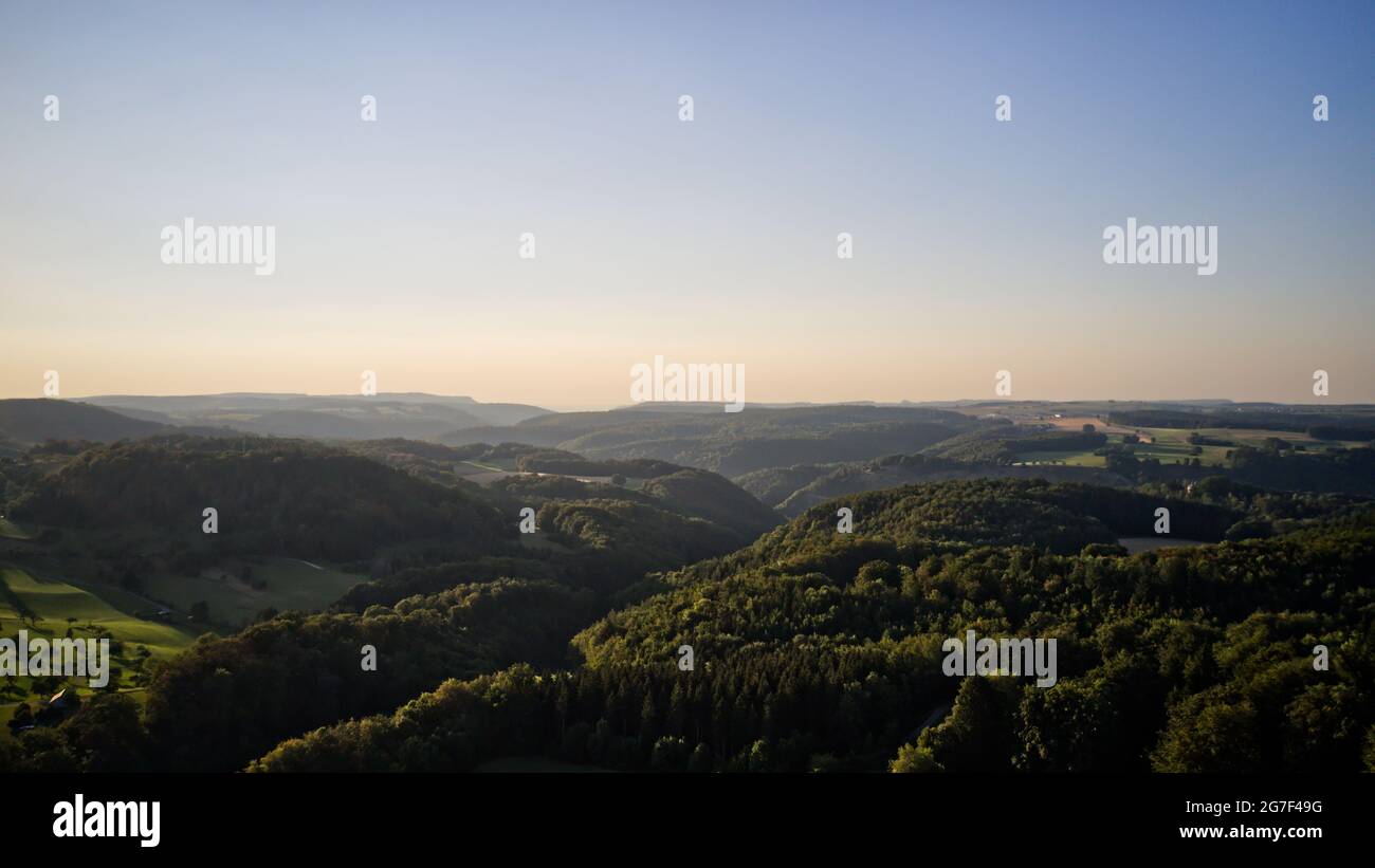Aerial view of green dense forests on a sunny day Stock Photo - Alamy