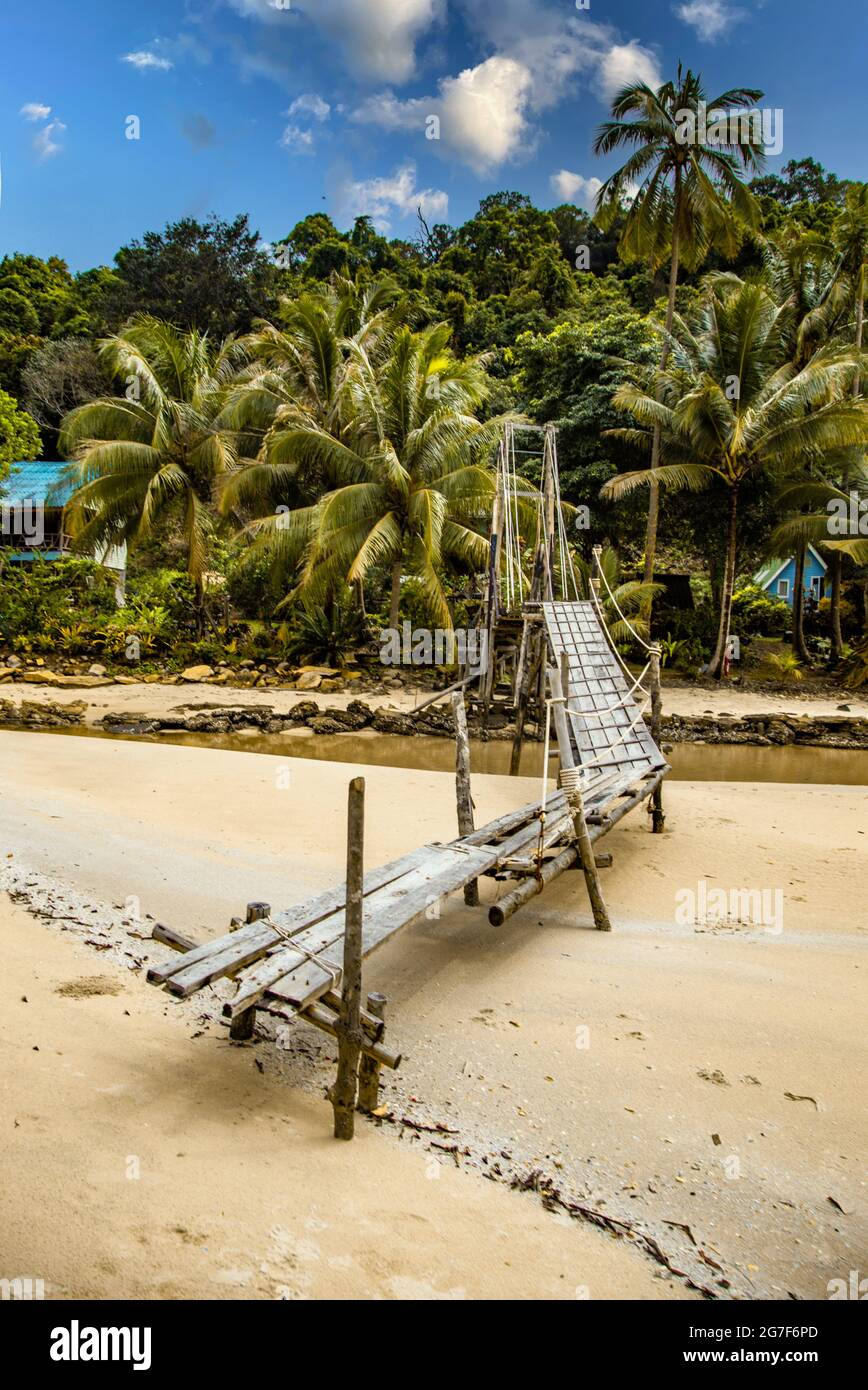 Wooden bridge at Bang Bao beach in Koh Kood island, Trat, Thailand Stock Photo