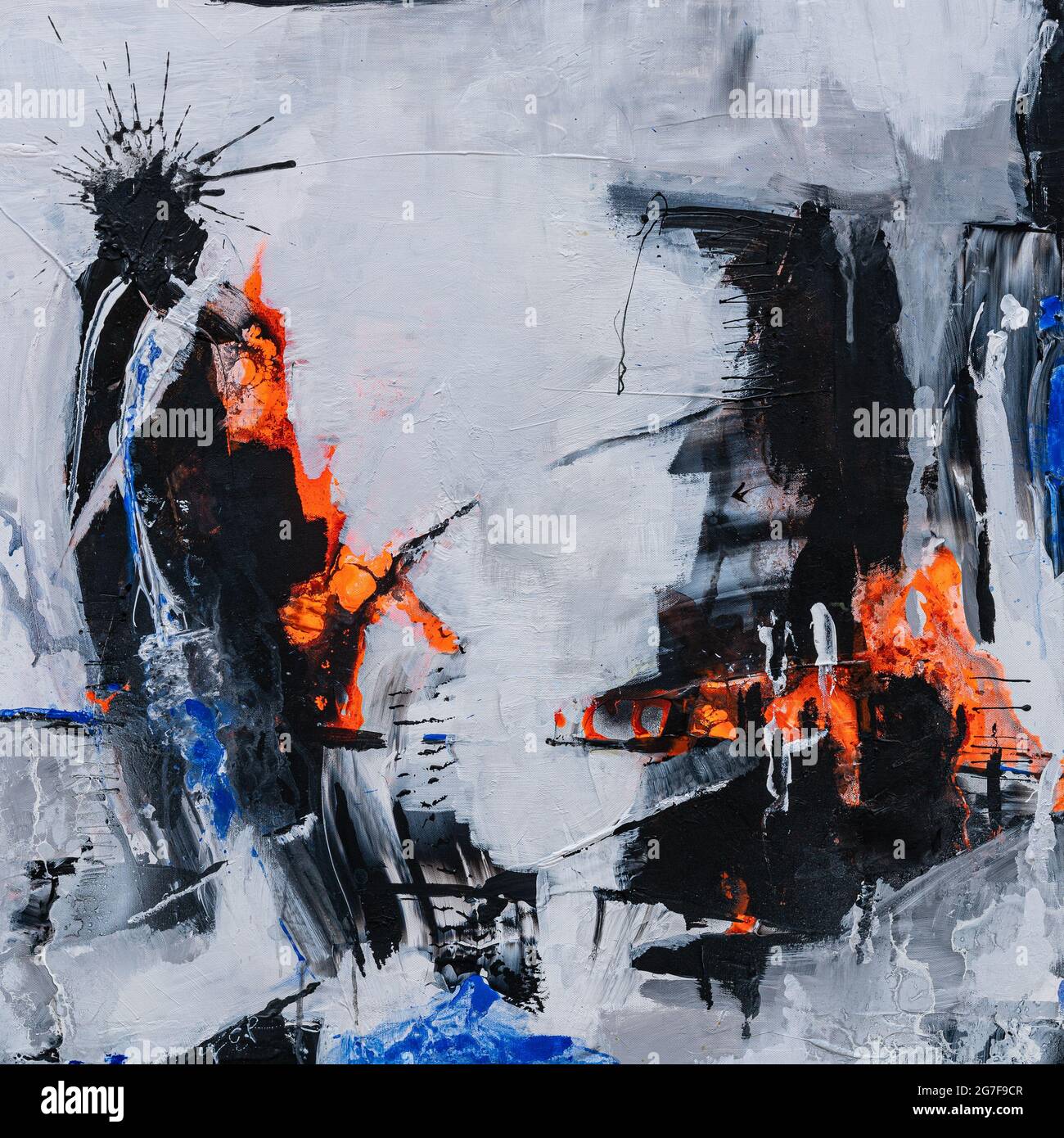 Closeup image of a textured white wall with black, white, and orange ...