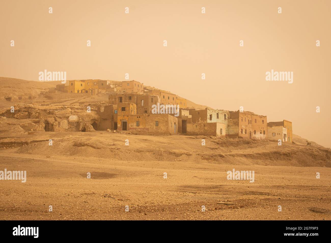 Luxor looking orange early in the morning after a sand storm, Egypt Stock Photo