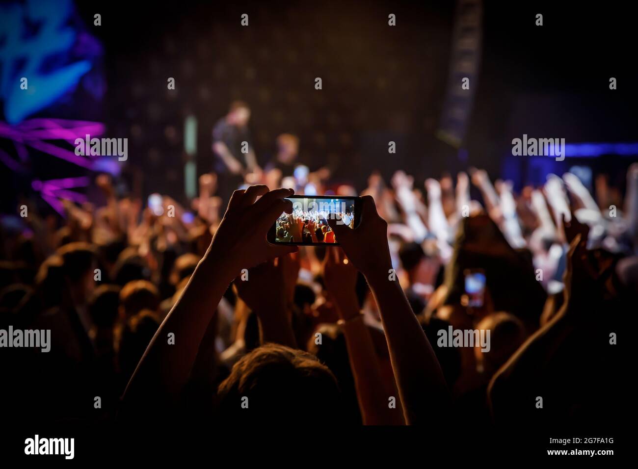 Smartphones on a music concert Stock Photo - Alamy
