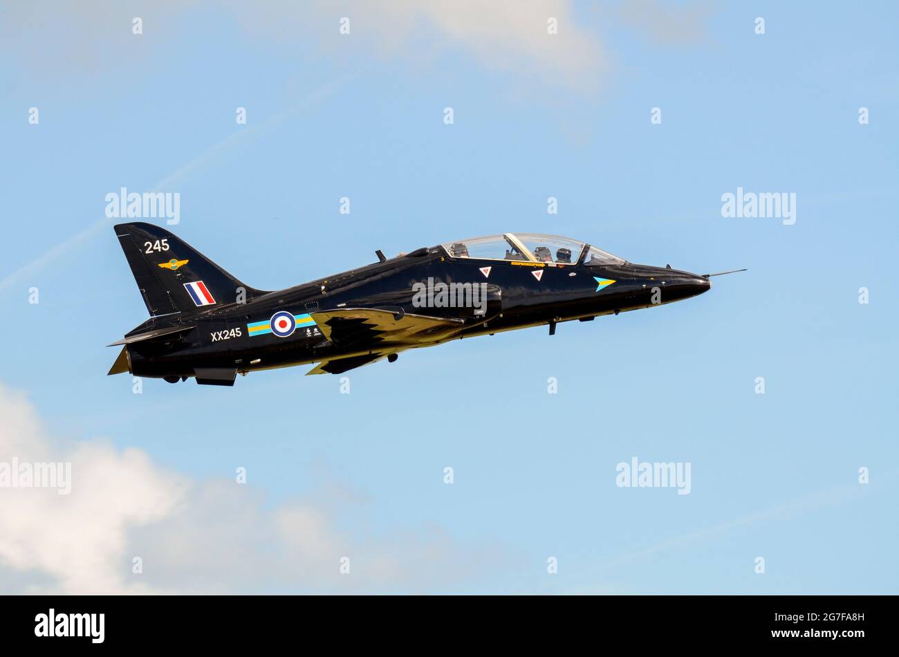 Royal Air Force British Aerospace Hawk T1 jet trainer plane climbing after take off. RAF 208 Squadron BAe Hawk T.1, part of 4 Flying Training School Stock Photo
