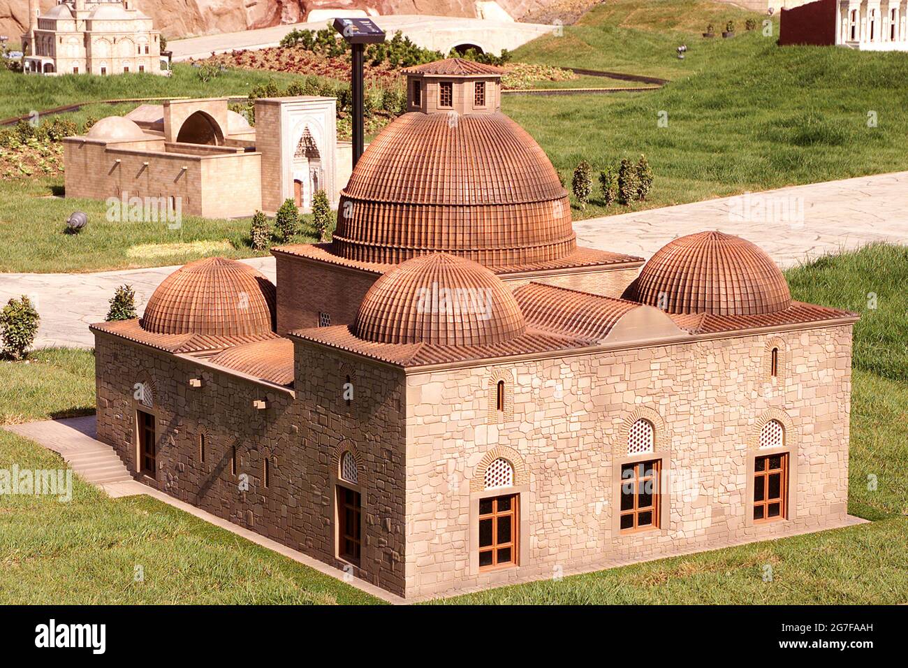 Karatay Madrasah of Konya at the Miniaturk miniature park on Golden Horn in Istanbul, Turkey. Miniaturk is one of the world's largest miniature parks. Stock Photo