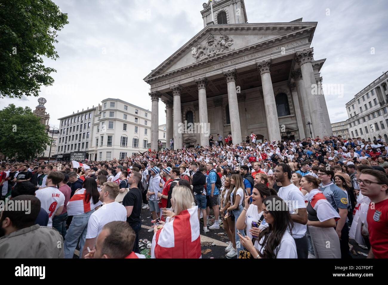 Euro 2020: Disorderly behaviour as thousands of football fans crowd near Trafalgar Square ahead of England vs Italy match finals. London, UK. Stock Photo