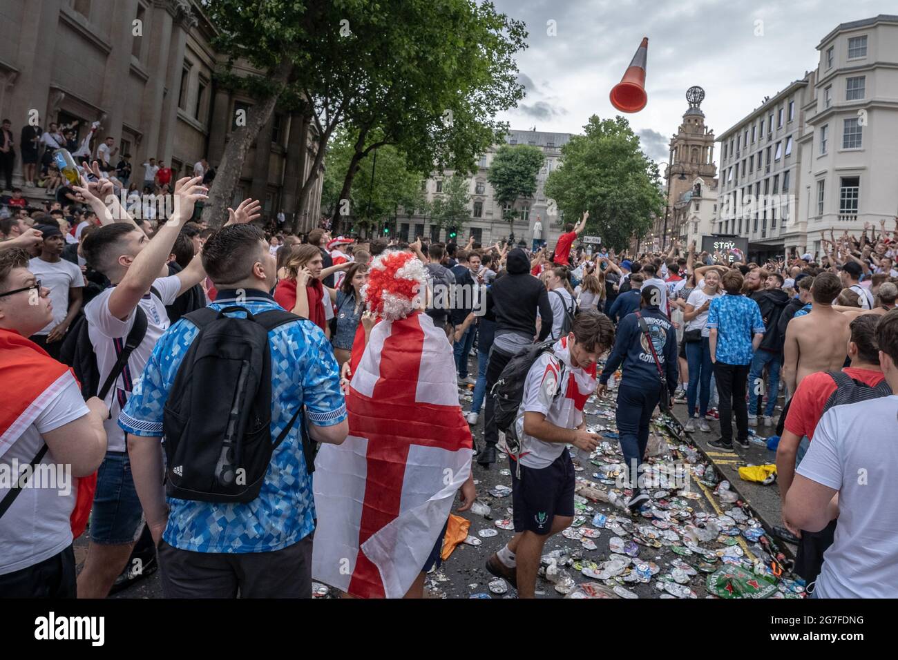 Euro 2020: Disorderly behaviour as thousands of football fans crowd near Trafalgar Square ahead of England vs Italy match finals. London, UK. Stock Photo