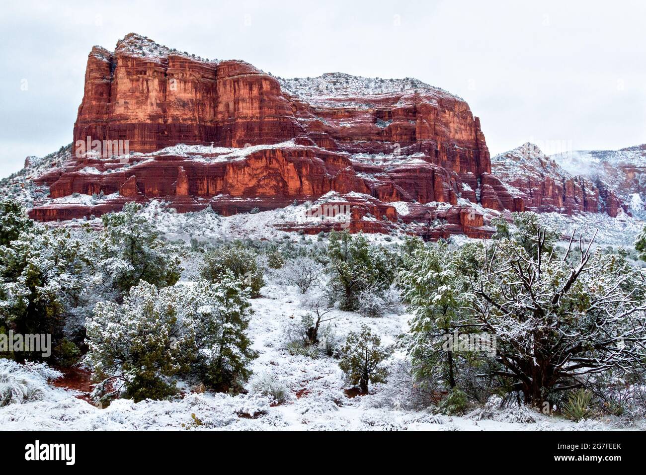 Courthouse Butte in Sedona, Arizona on a beautiful winter day after a snowstorm. Arizona desert winter landscape. Snow in Sedona. Stock Photo