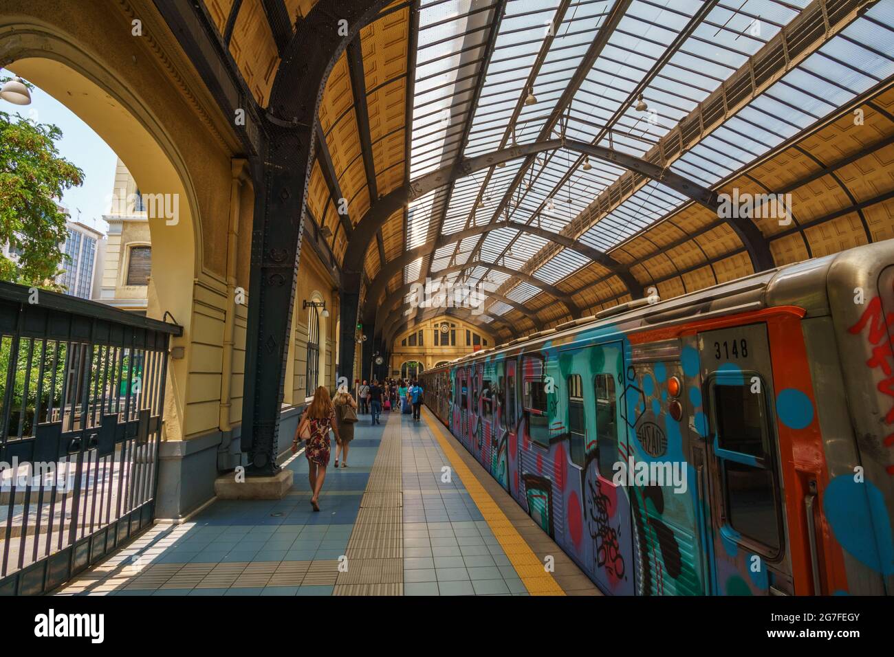 PIRAEUS, ATTICA, GREECE- JULY 2017. Inside the historical train (& metro) station at the port of Piraeus. Urban scenery with traffic of travelers and Stock Photo