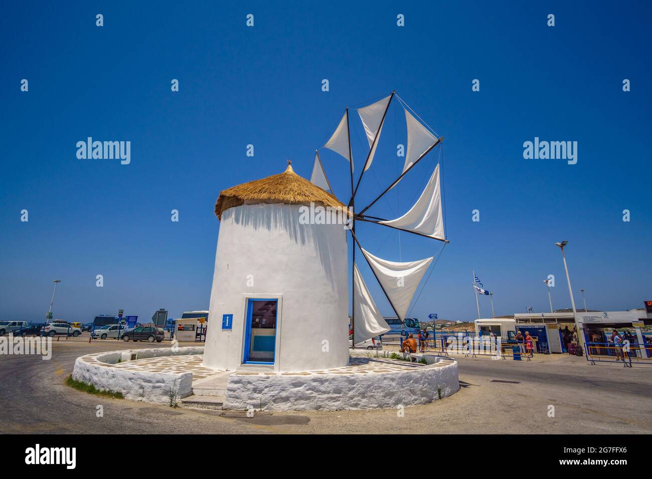 PAROS, CYCLADES, GREECE - JUNE 2017: Traditional cycladic windmill against a deep blue sky in a beautiful summer day on Paros island, Cyclades, Greece Stock Photo