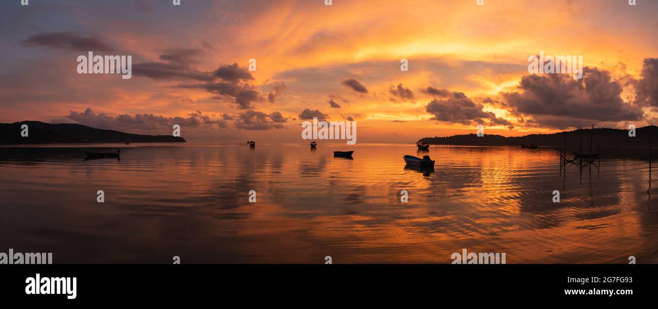 Panorama of the most amazing sunrise in all of History. Taken from Koh Rong island in the south Cambodian sea Stock Photo