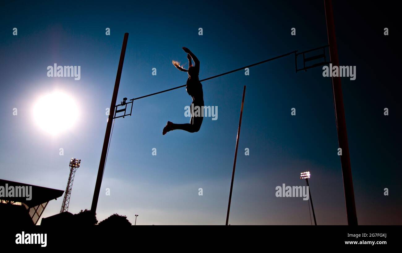 Gateshead, England, UK. 13th July, 2021. A silhouette of a competitor in action during the women's pole vault final, during the Gateshead 2021 Müller British Grand Prix, at Gateshead International Stadium. Credit: Iain McGuinness/Alamy Live News Stock Photo