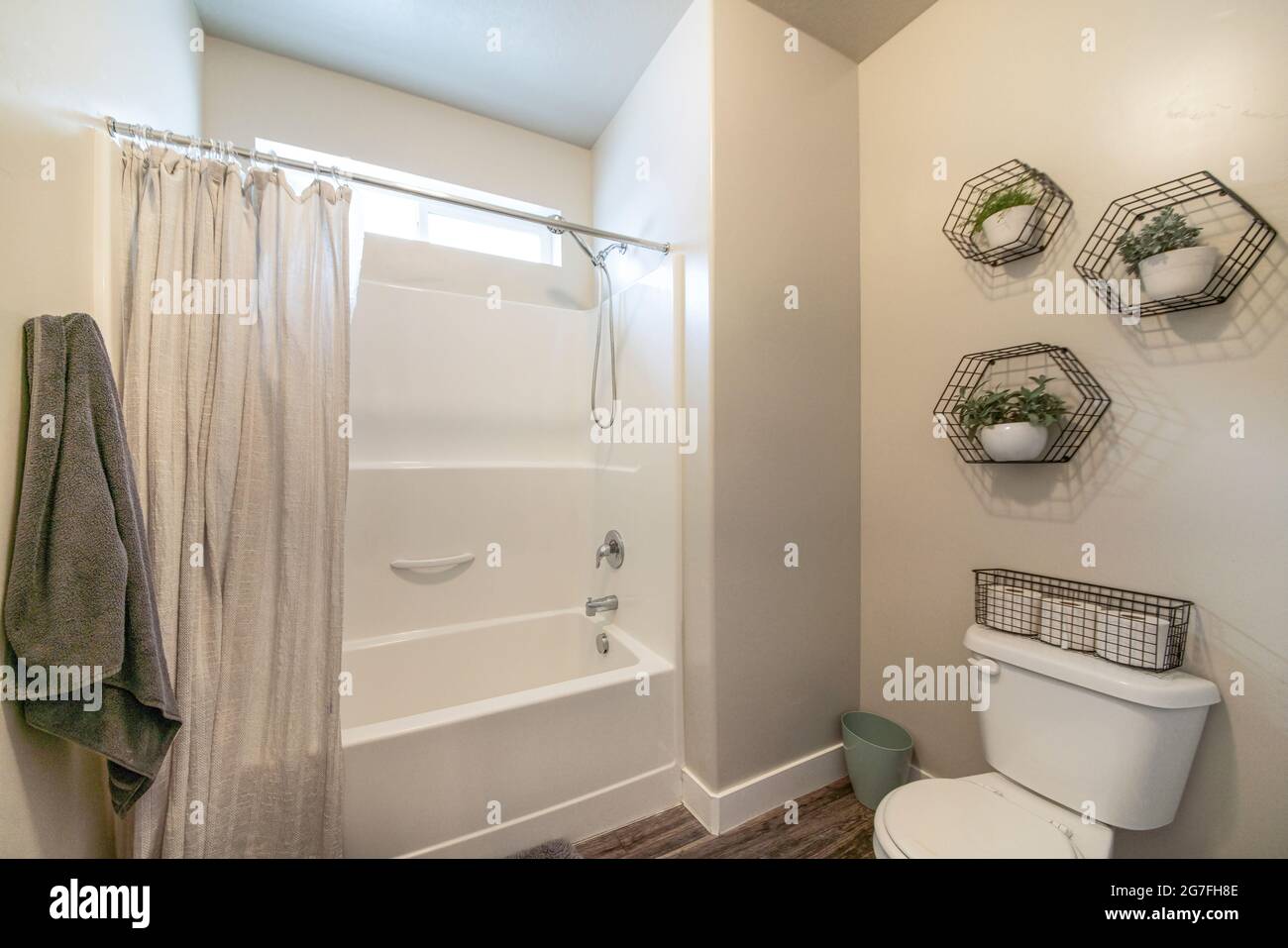 Bathroom interior with metal wire storage displays Stock Photo Alamy