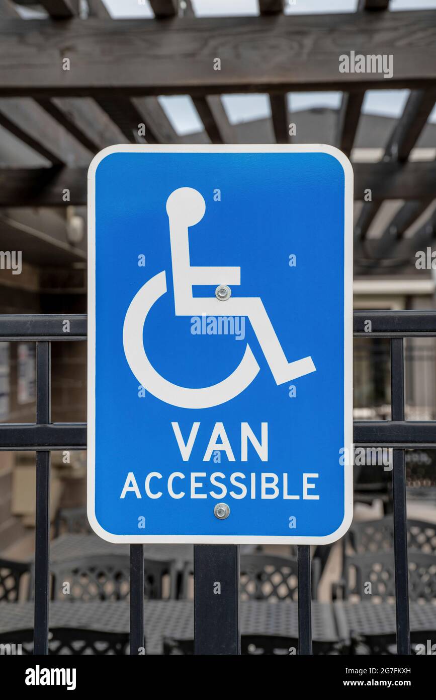 Portrait of a handicapped parking accessibility signage Stock Photo Alamy