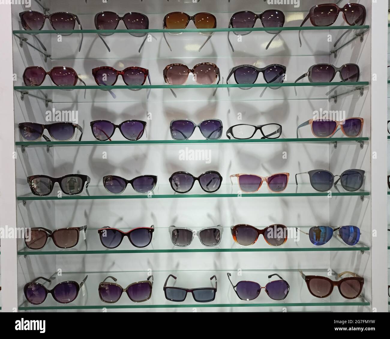 Numerous Sun glasses kept for display Stock Photo