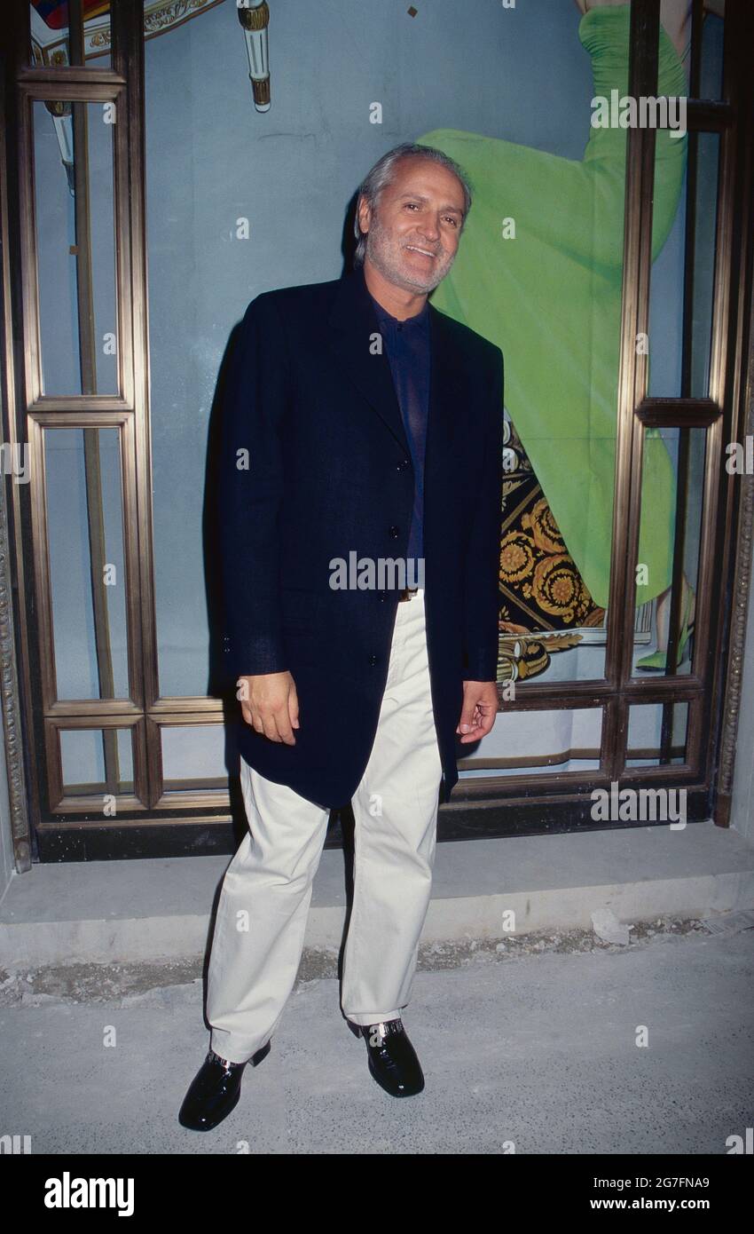 Gianni Versace in front of the Versace flagship store on Fifth Avenue