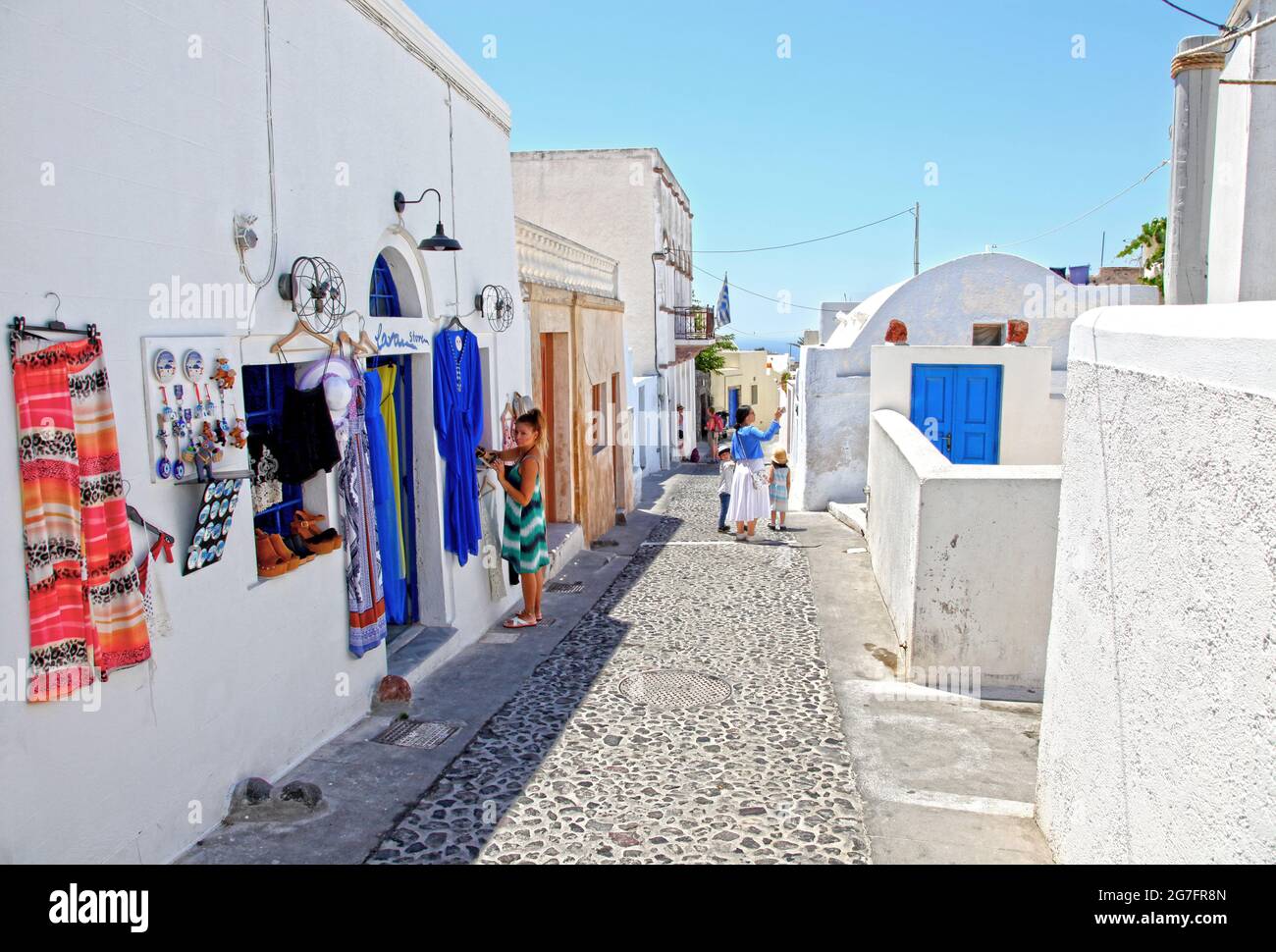 A souvenir shop in the traditional village of Megalochori on the island of Santorini in Greece. Stock Photo