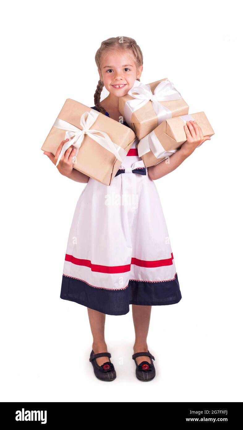 Portrait of little girl holding gift box isolated Stock Photo - Alamy