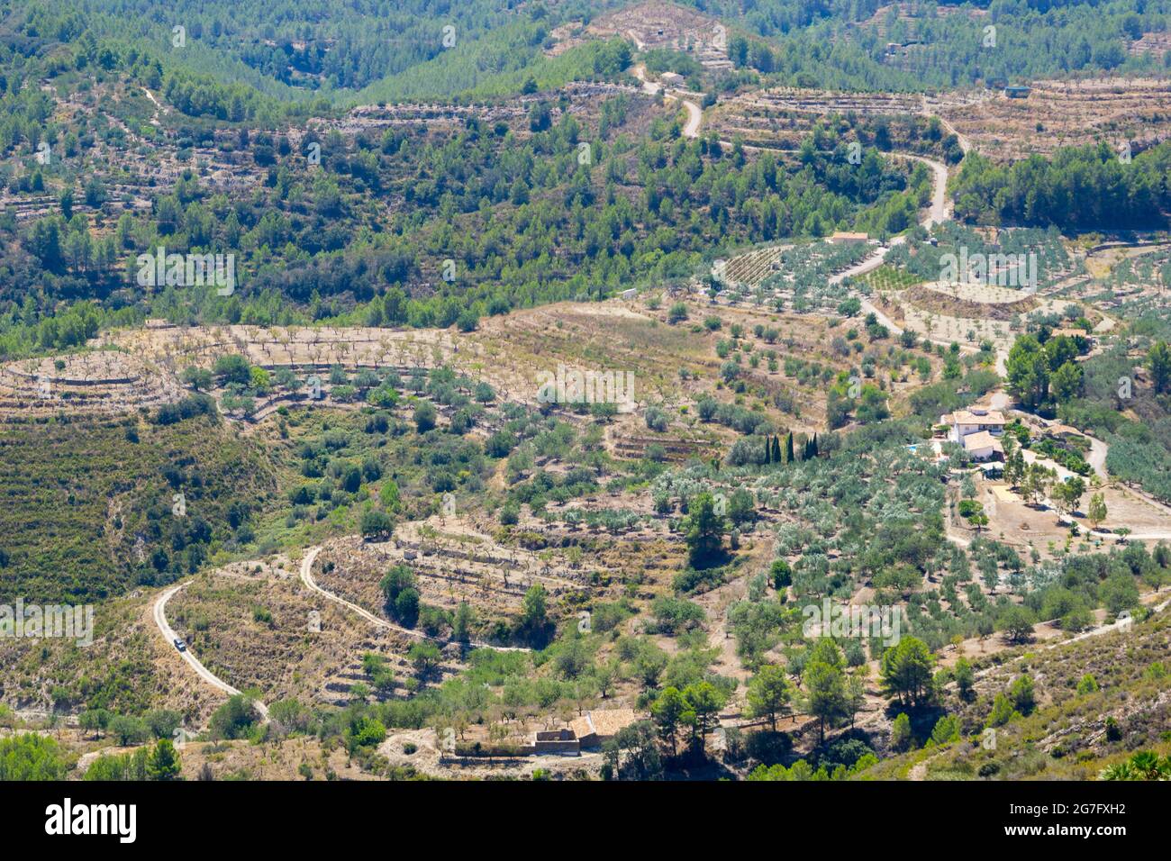 Coll de Rates landscape view showing the stone walled terrace among the ...