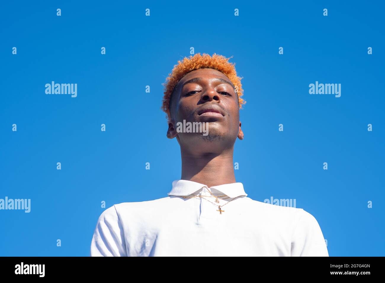 Young man with bright colored hair shot up close Stock Photo