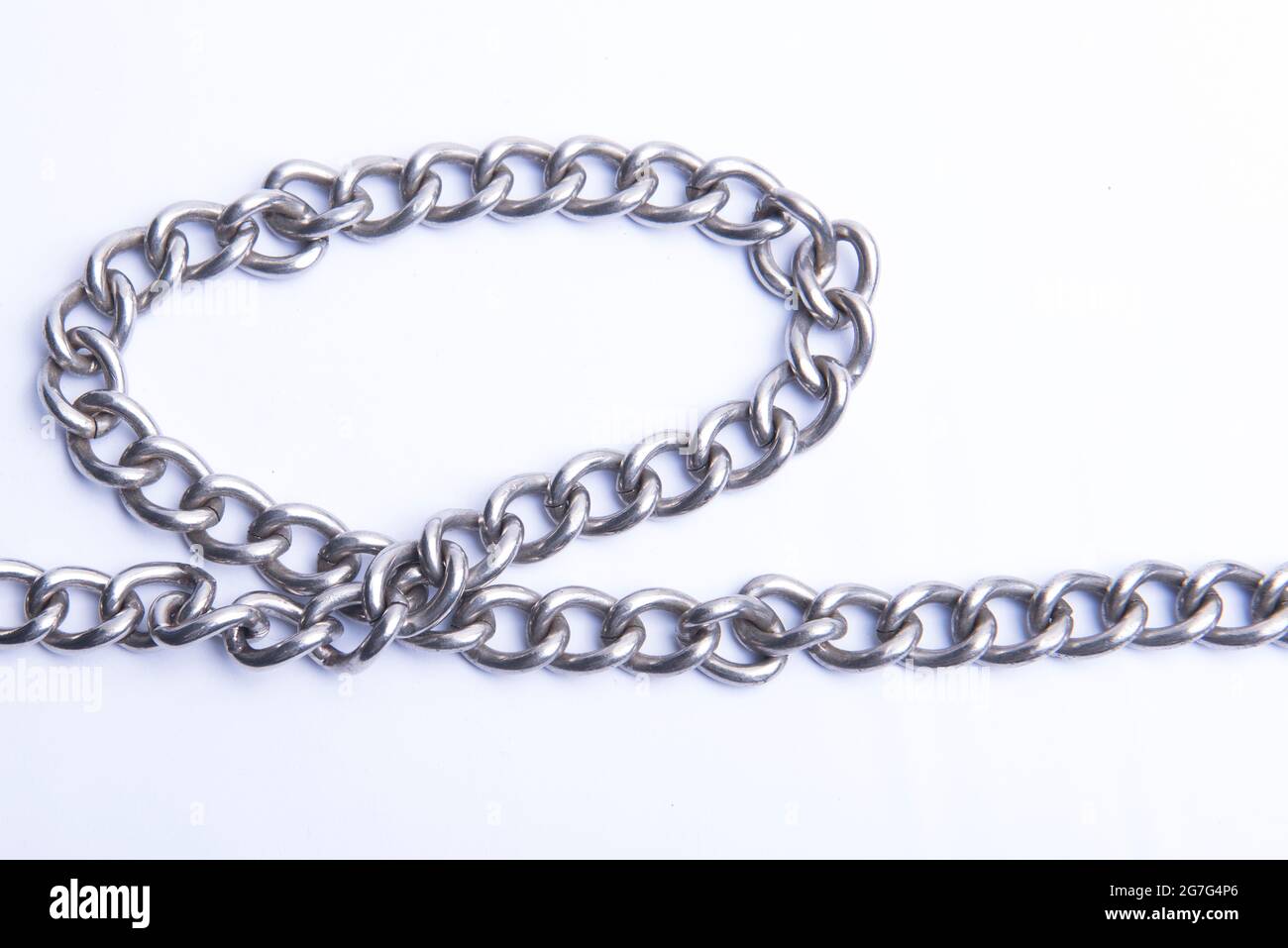 Chain of metal steel isolated over white background Stock Photo Alamy