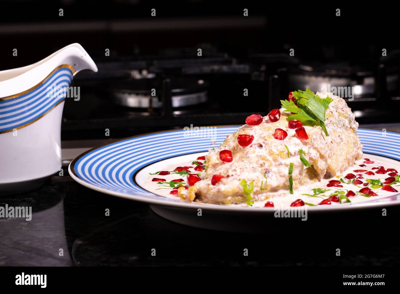 Chiles en Nogada , traditional mexican cuisine in Puebla Mexico. chiles poblanos Stock Photo