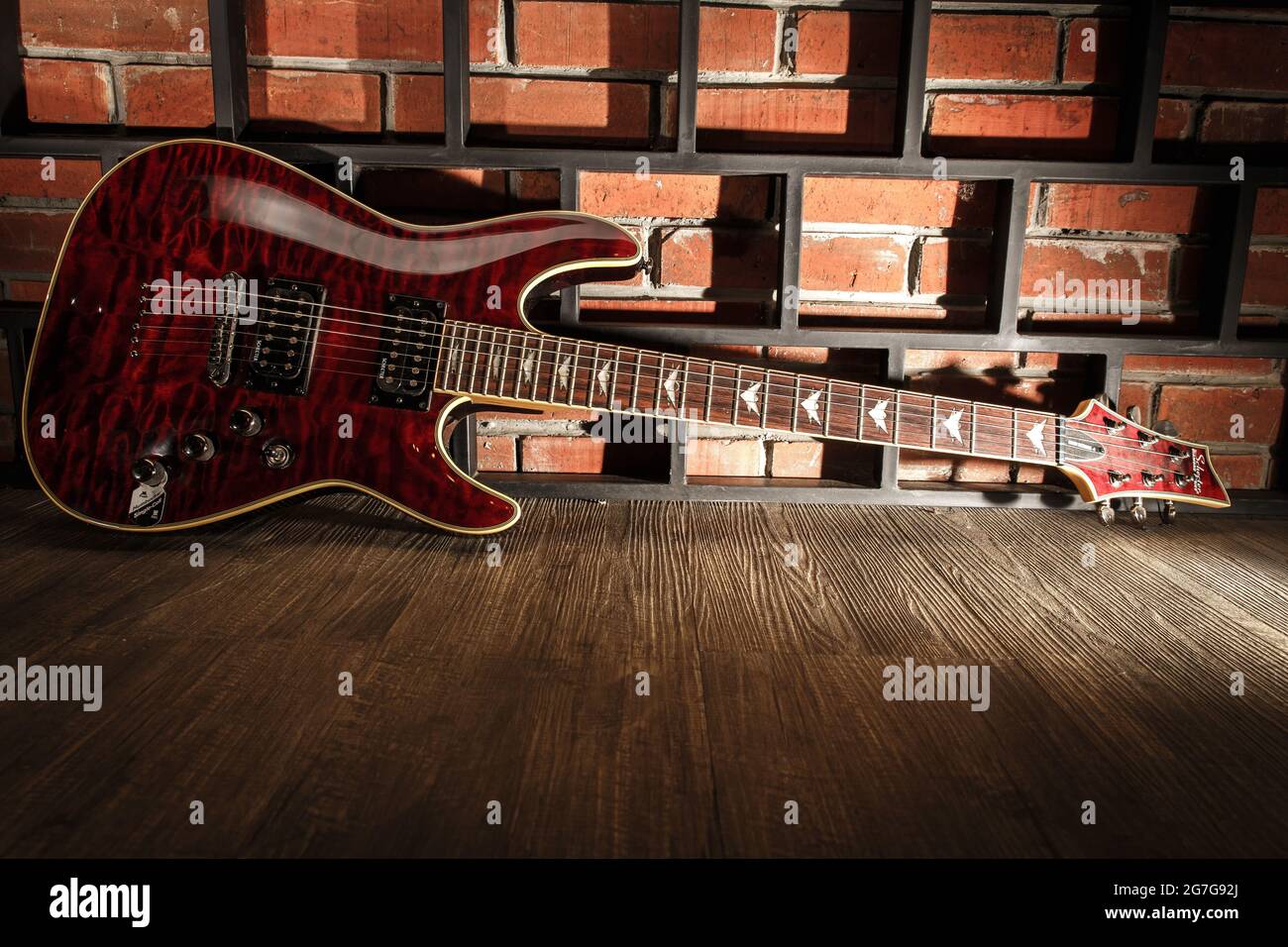 Shiny electric guitar with dramatic lighting Stock Photo Alamy