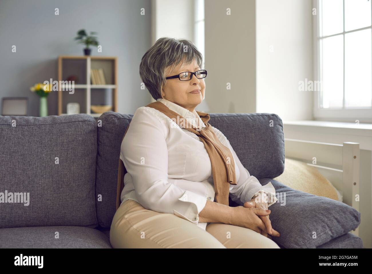 Happy woman home mature hi-res stock photography and images - Alamy