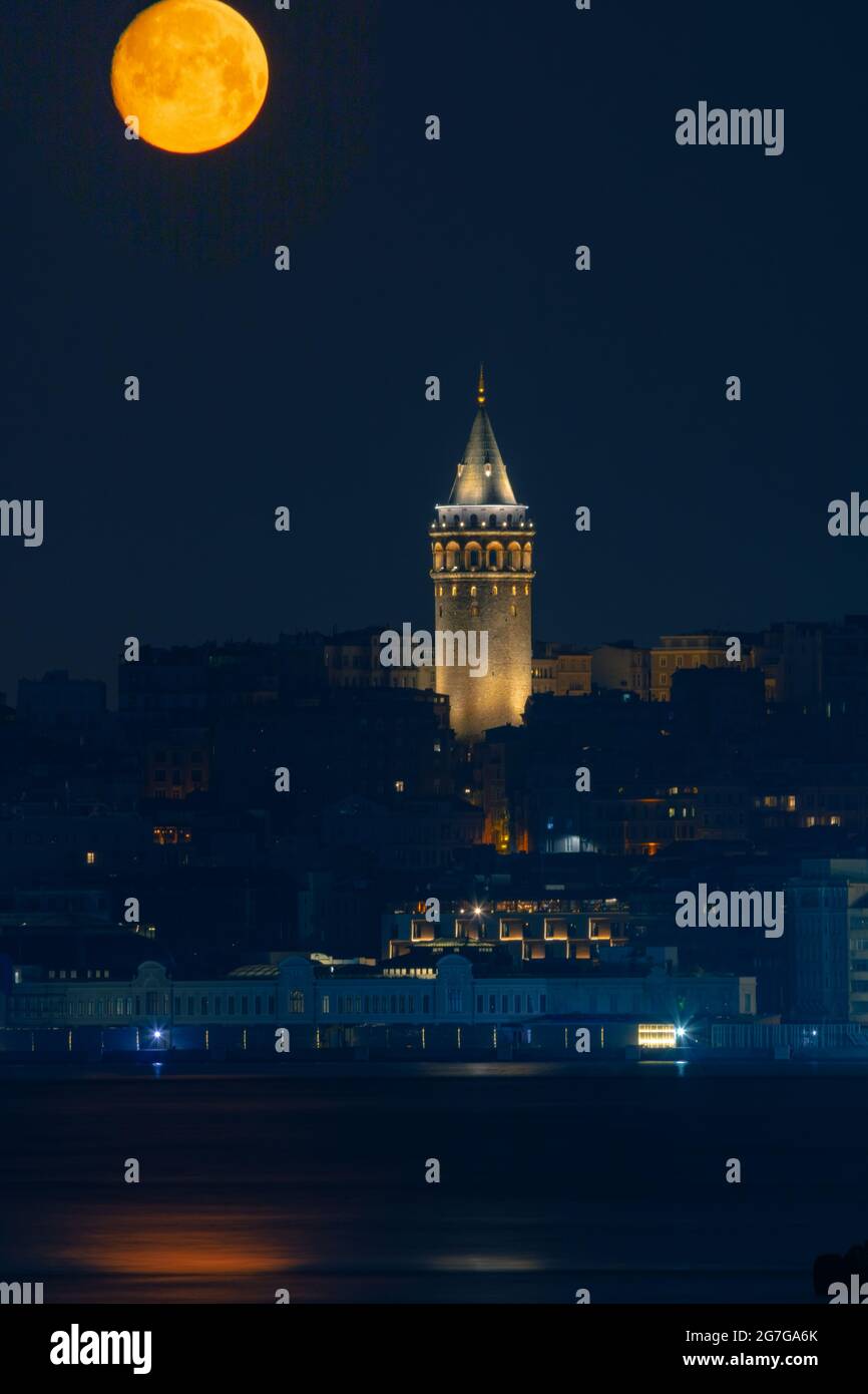 Moonset and Galata Tower  Stock Photo